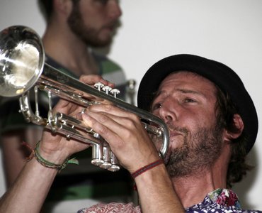 chris playing the trumpet
